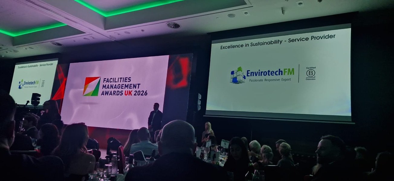 The Facilities Management Awards UK 2026 ceremony room, with Envirotech FM on screen for Excellence in Sustainability