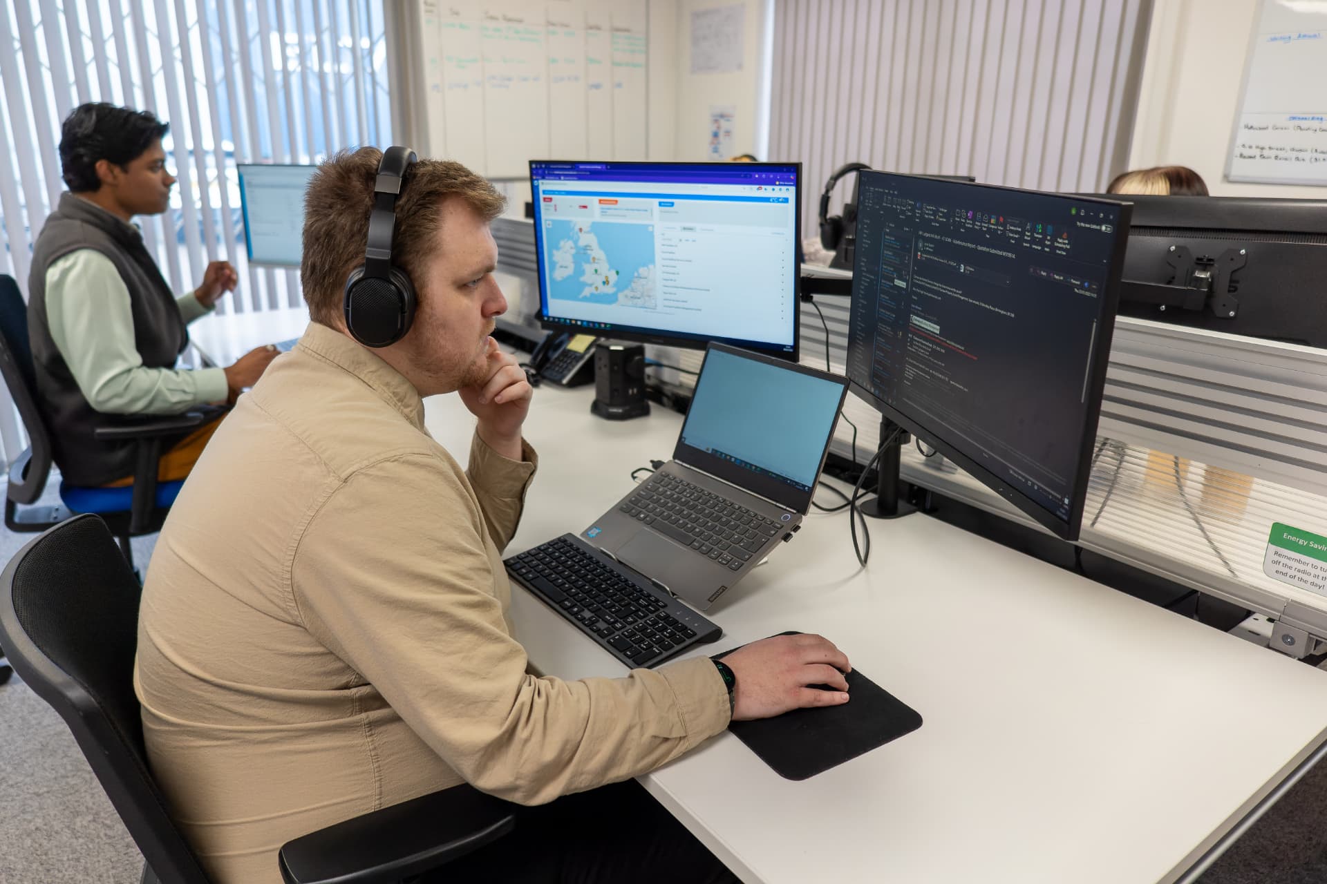 Envirotech FM colleague working at the Customer Service Desk
